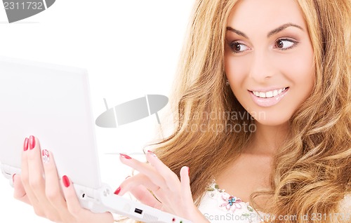 Image of happy woman with laptop computer