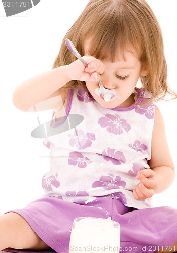 Image of little girl with yoghurt