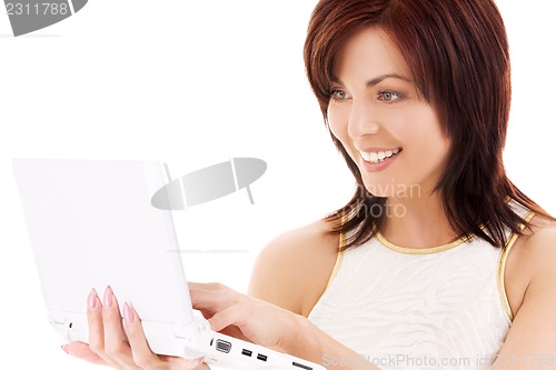 Image of happy woman with laptop computer