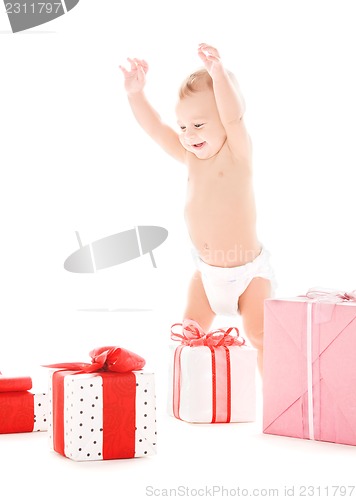 Image of baby boy with gifts