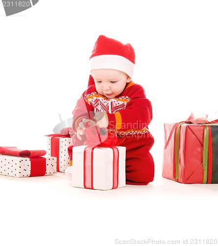 Image of santa helper baby with christmas gifts