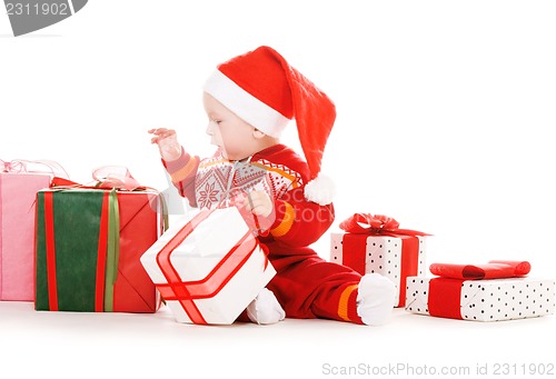 Image of santa helper baby with christmas gifts