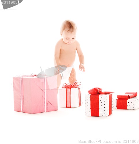 Image of baby boy with gifts