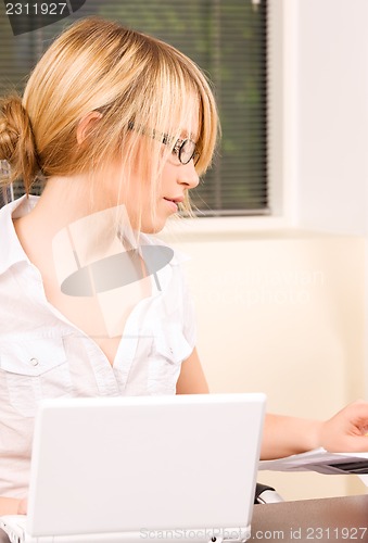 Image of office girl with laptop computer