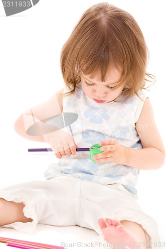Image of little girl with color pencils