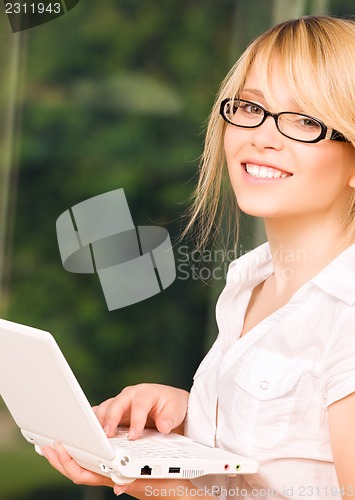 Image of office girl with laptop computer