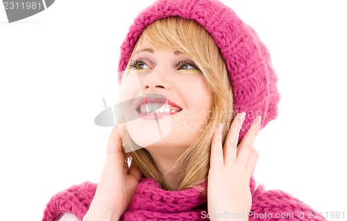 Image of happy teenage girl in hat