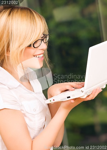 Image of office girl with laptop computer