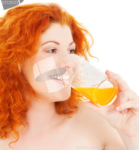 Image of lovely woman with glass of juice