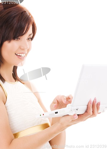Image of happy woman with laptop computer