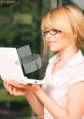 Image of office girl with laptop computer