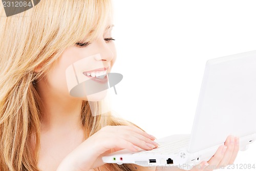 Image of teenage girl with laptop computer