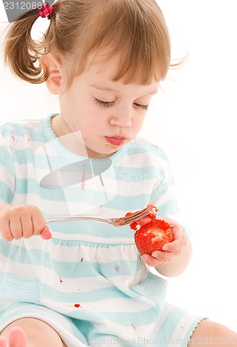 Image of little girl with strawberry