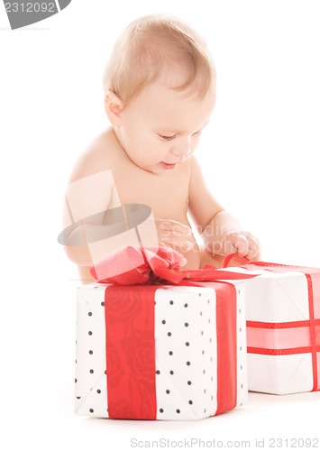 Image of baby boy with gifts