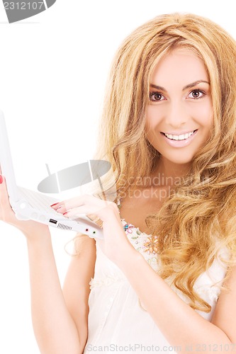 Image of happy woman with laptop computer