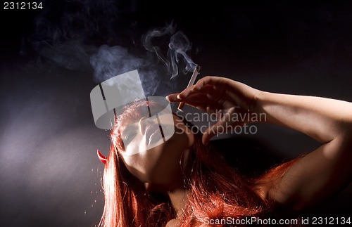 Image of smoking devil