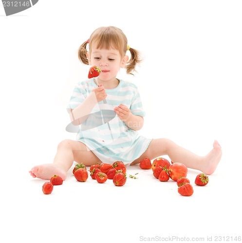 Image of little girl with strawberry