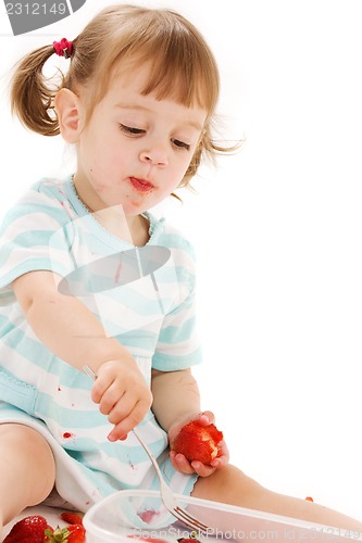 Image of little girl with strawberry
