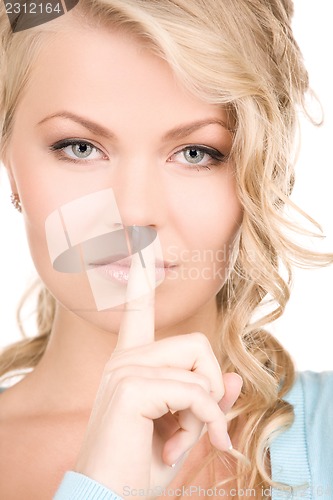 Image of finger on lips