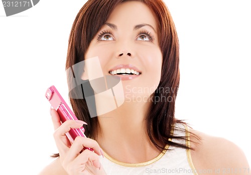 Image of happy woman with cell phone