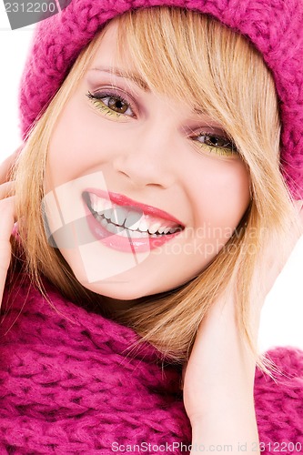 Image of happy teenage girl in hat