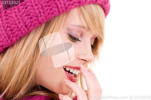 Image of happy teenage girl in hat