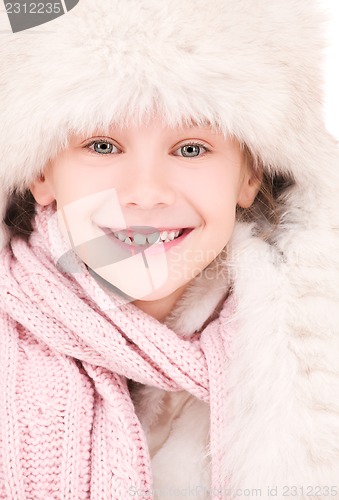 Image of happy girl in winter hat