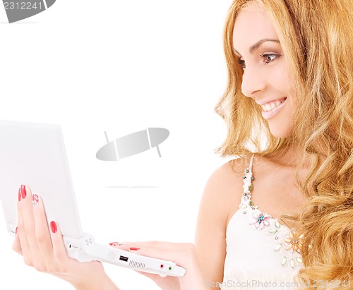 Image of happy woman with laptop computer