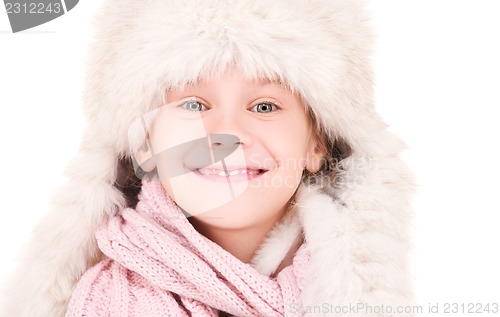 Image of happy girl in winter hat