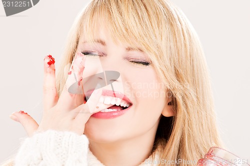 Image of happy teenage girl with raspberry jam