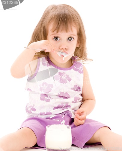 Image of little girl with yogurt
