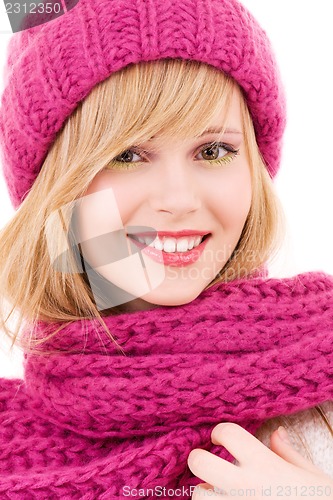 Image of happy teenage girl in hat