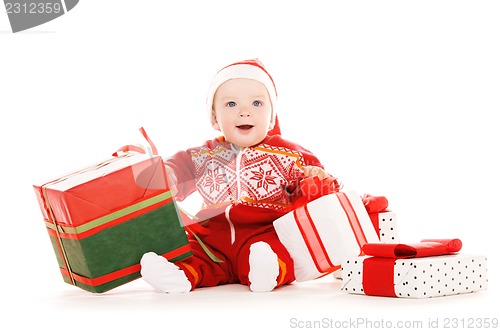 Image of santa helper baby with christmas gifts