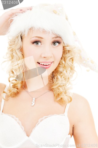 Image of cheerful santa helper girl