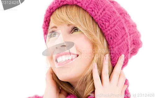 Image of happy teenage girl in hat