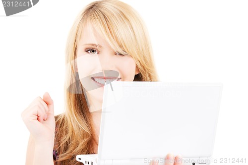 Image of teenage girl with laptop computer
