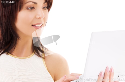 Image of happy woman with laptop computer