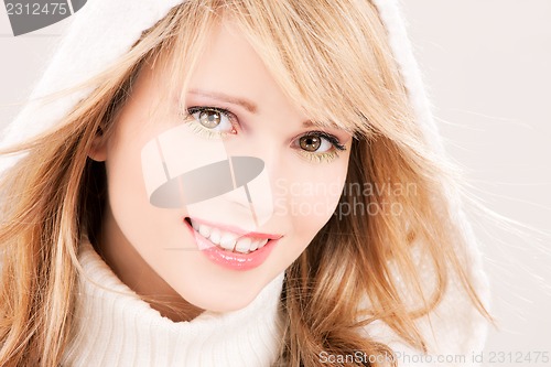 Image of lovely teenage girl in hoodie