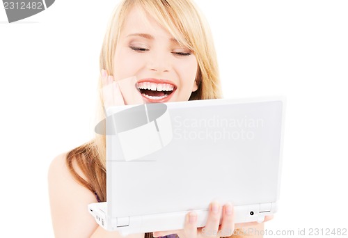 Image of teenage girl with laptop computer