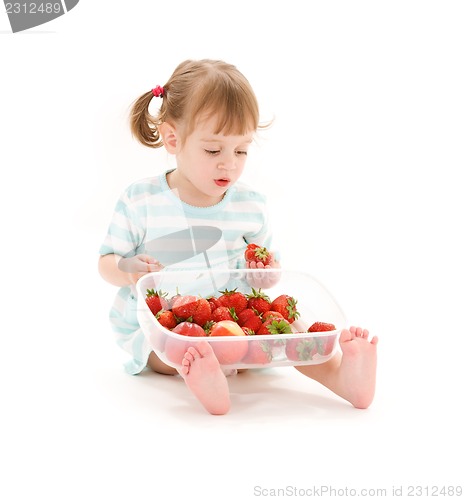Image of little girl with strawberry