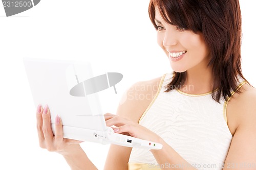 Image of happy woman with laptop computer