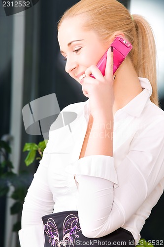 Image of lovely woman with cell phone