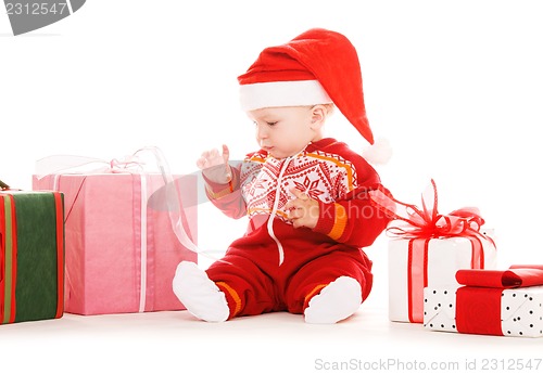 Image of santa helper baby with christmas gifts