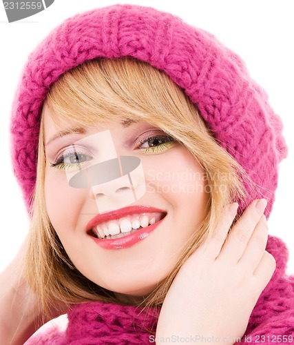 Image of happy teenage girl in hat