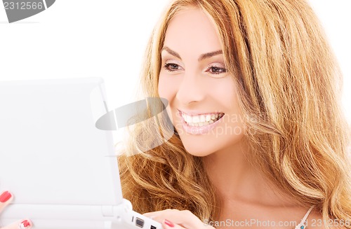 Image of happy woman with laptop computer