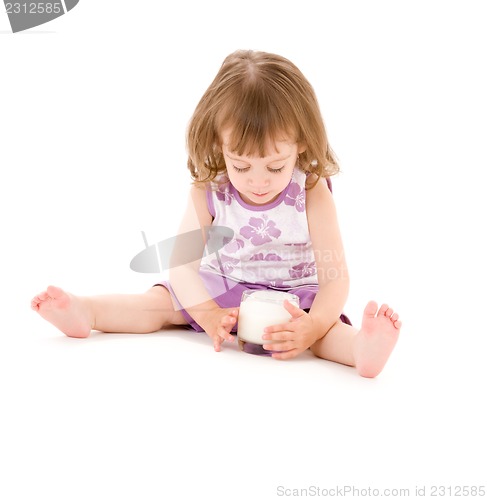 Image of little girl with glass of yoghurt