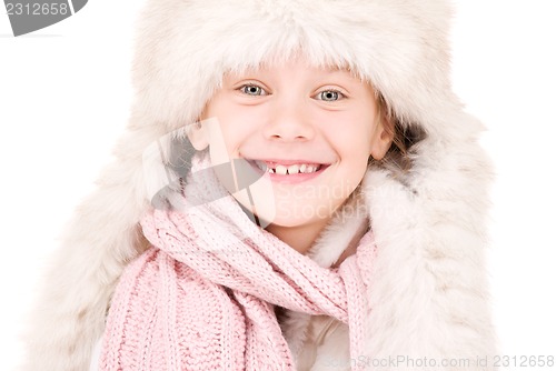 Image of happy girl in winter hat