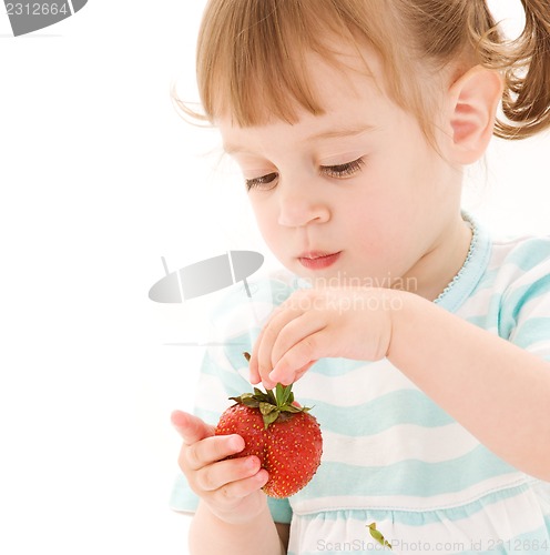 Image of little girl with strawberry