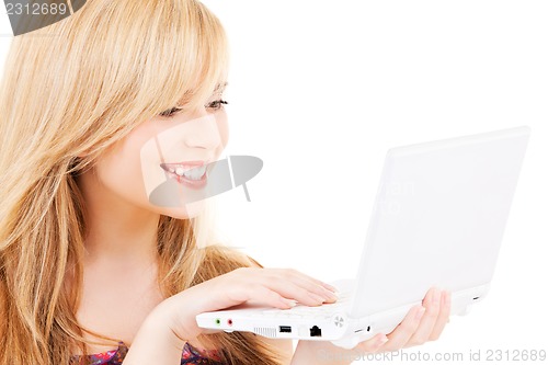 Image of teenage girl with laptop computer