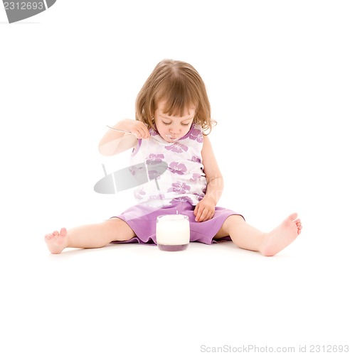 Image of little girl with yogurt